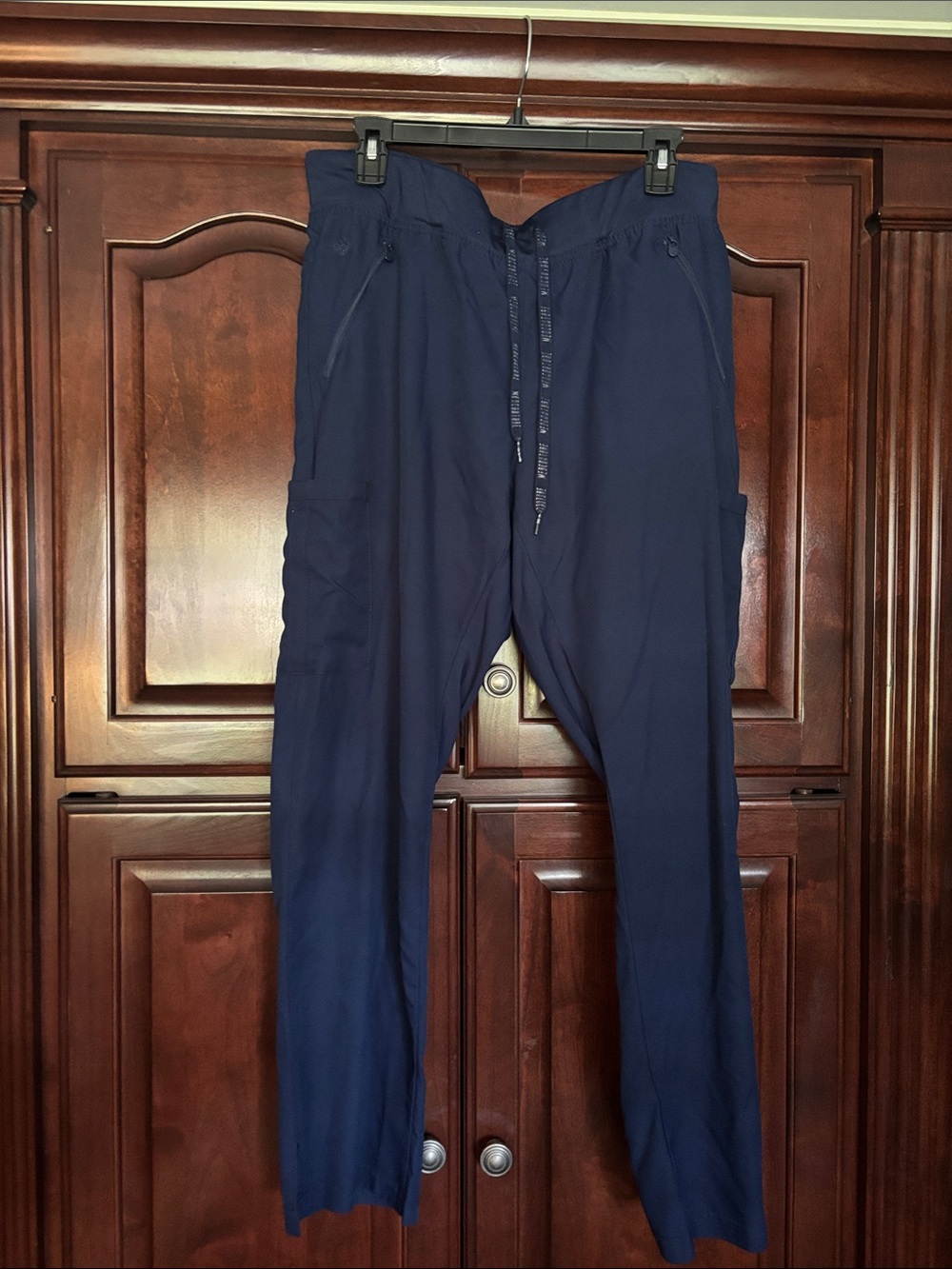 MEDCOUTURE SIZE LARGE NAVY SCRUB PANTS. Stitch skipped as pointed out